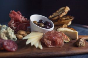 Charcuterie Board with Artisan Salumi, Pickled Vegetables, Seasonal Fruit Mostarda, Grilled Bread at Ad Lib Craft Kitchen & Bar in Harrisburg, PA